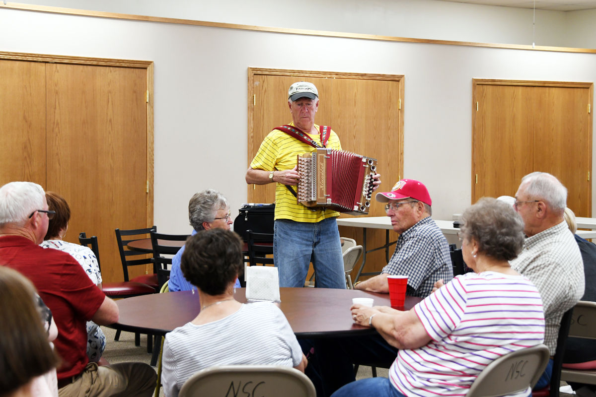 186 Franklin Hronik entertains the Fun Club at an ice cream break in Neligh.JPG